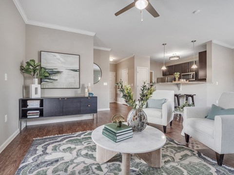 a living room with couches and a coffee table